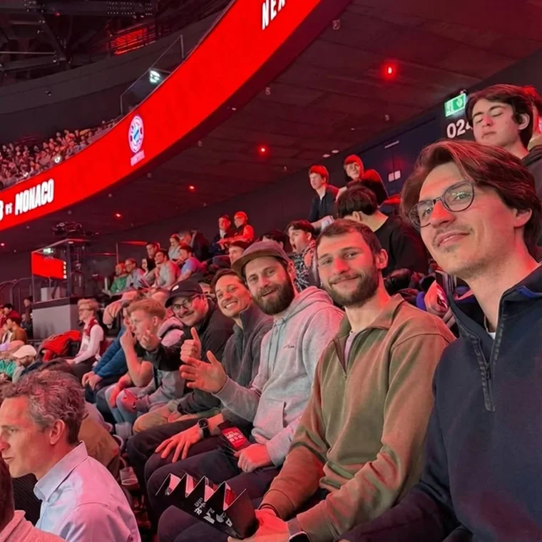 The MediPulse team together in the stands at a sports event
